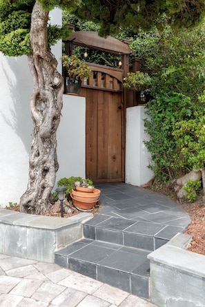 Enter through our Zen-style private alley.