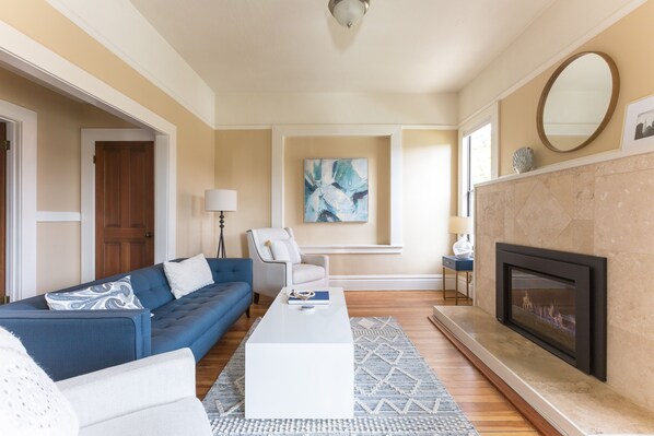 Our living room with Serena and Lilly furniture and gas fireplace.