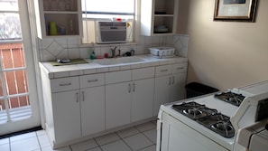 White fully equipped kitchen