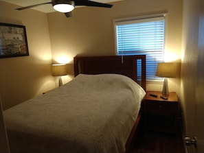 Bedroom with queen bed, 32"LCD TV with smart cable box. ceiling fan