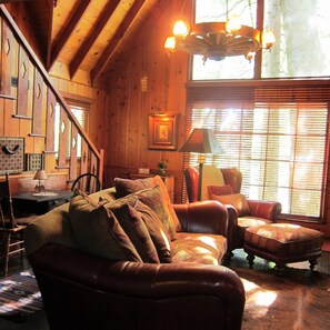 Vaulted 30' floor-to-ceiling windows, renovated original and updated features.