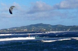 Some of our complimentary entertainment! Kite surfers  'visit' frequently.