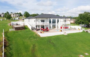 View of the back patio of house that over looks the lake