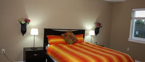 Master bedroom with queen size bed and 100% cotton sheets