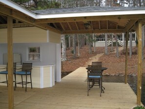 Private, gentle wooded lot and awesome boathouse