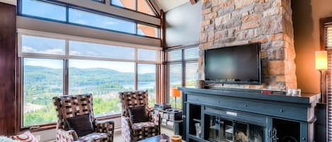 Living room with stunning views and fireplace