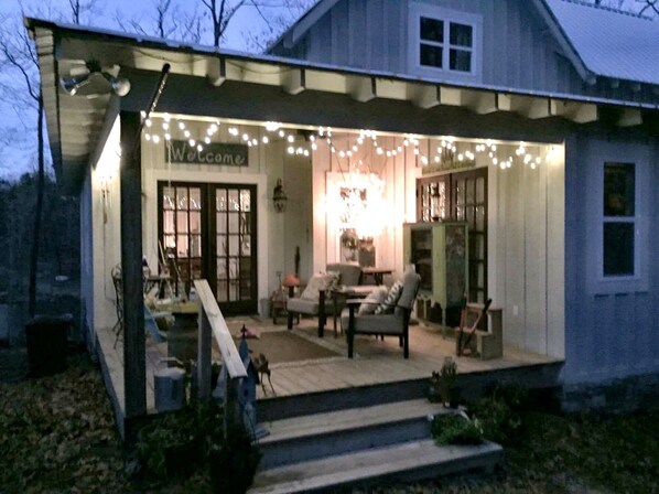 Life is good relaxing underneath the cafe lights on the porch. 