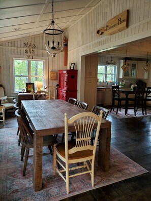 Inside the mountain farmhouse! Open space, rustic floors & whitewashed walls!