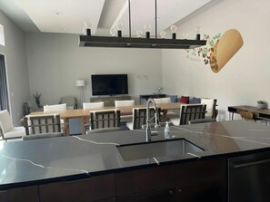 Main House kitchen looking onto dining and living