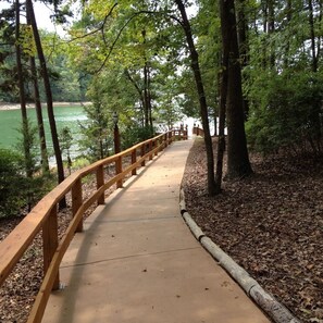 Gently sloping concrete path leading to dock.  Note sturdy handrail for safety.