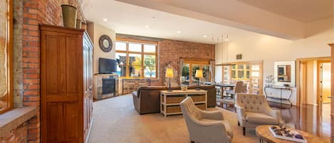 Great room from condo entry/mudroom 