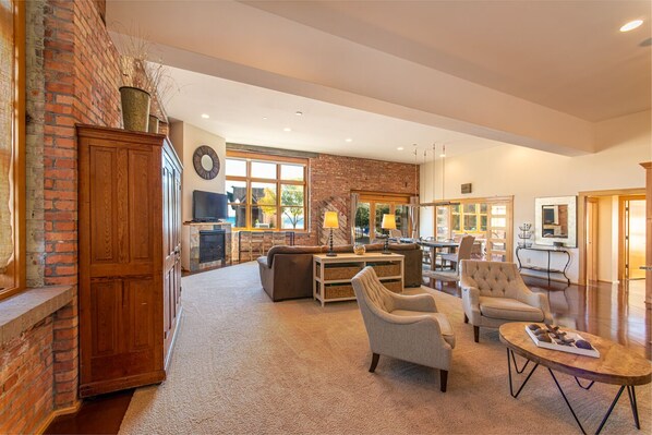 Great room from condo entry/mudroom 