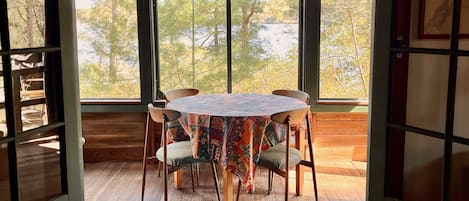 Screened porch has a fantastic view of the lake.