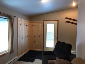 Den coat hooks and boot mats