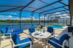 View of Pool deck area & pool furniture