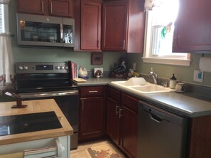 New GE convection oven/stove, microwave and dishwasher. 