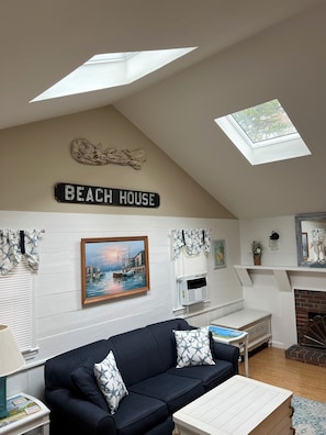Large living area with Dual Skylights
