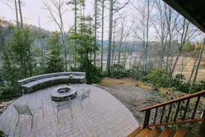 Our fire pit seating area offers you views of the New River below & stars above!