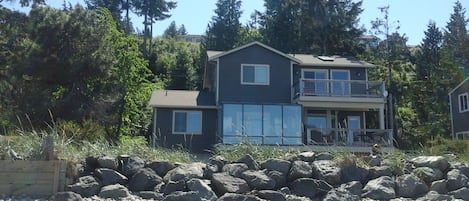 back of the house W/sunrm facing ocean 50 Ft from the beach 