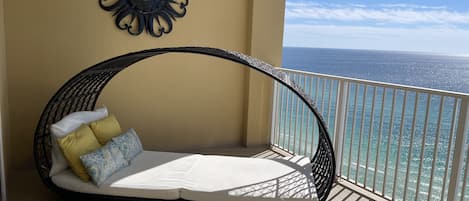 Lounge luxuriously on this 2 person daybed on your gulf front balcony 