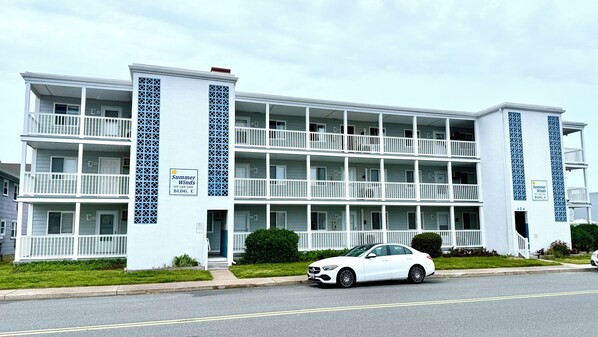 Brand new vinyl railings and composite decking on the building. 