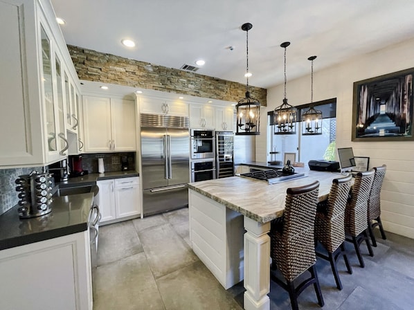 Chefs Kitchen with Wolf & KitchenAid Appliances! Open to Dining & living