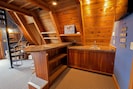 Wet bar area with tv