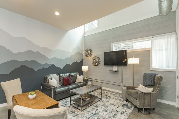 Open living space with original nashville mural.