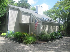 Close up view of the home. Hydrangea's in bloom! 