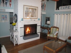 Beautiful see-through fireplace turns on with the flip of a switch!What ambiance