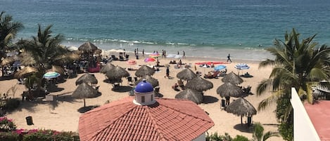 Stunning View of Blue Chairs Beach from Balcony