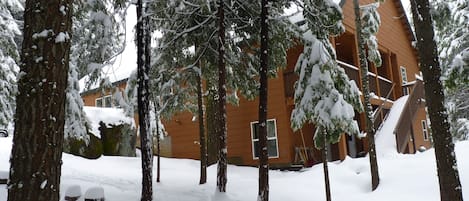 The back of the house in the snow