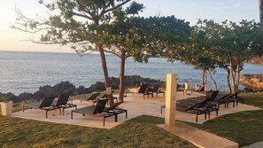 The large coral stone deck is the best place for admiring the beautiful sunsets.