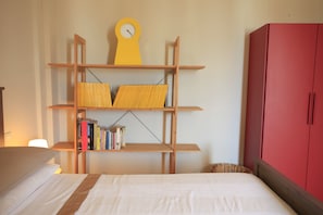 The sleeping room with library and cupboard