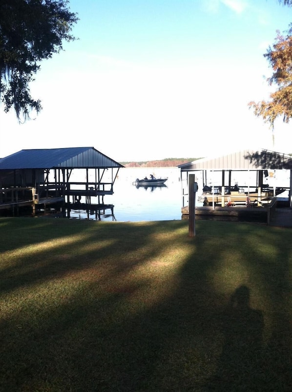 Your view of the creek from across the street. Your covered dock is on right.