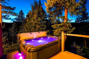 [Lower Deck] The hot tub is your all-weather, all-year-round sanctuary.
