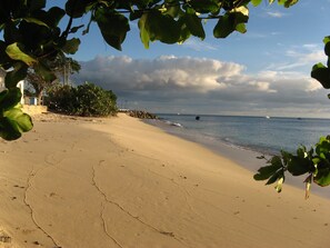 Evening at the beach in front of the White Sands building