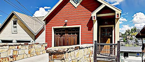 Fall view of Garage & front entrance to this stunning 4 bedroom designer home 