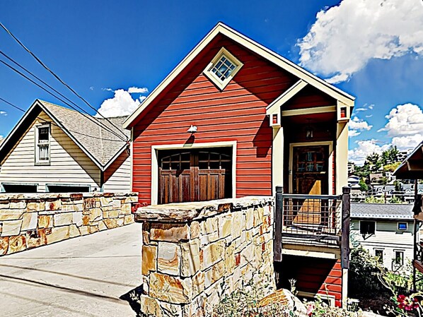 Fall view of Garage & front entrance to this stunning 4 bedroom designer home 