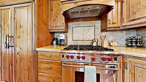 Luxury designer kitchen with sub-zero fridge and wolf stove 