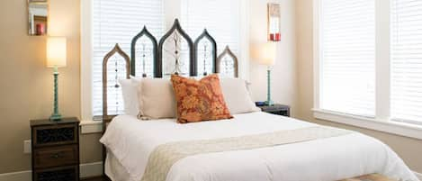 Front Bedroom with handmade headboard and a rustic chic ambiance.