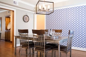 Industrial chic dining room with a taste of rustic.  