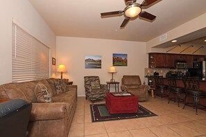 Living Room with Queen Sofa Sleeper, Chair and Recliner