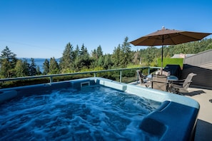 Enjoy your own private jacuzzi hot tub with amazing water & mountain views