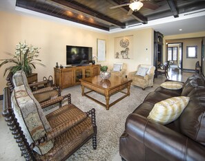Living room with plenty of seating for 8 people.
