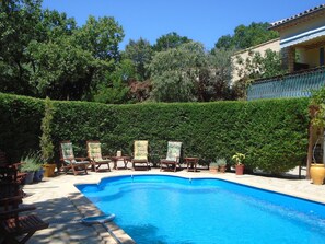 Peaceful pool area for early morning coffee or apero le soir.
