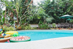 The pool is communal, shared by all guests, there are also floats and toys for kids of all sizes