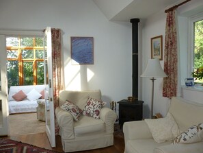 Looking from the living room into the conservatory