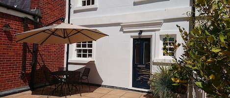 Island View, suntrap terrace with sea view, ideal for alfresco dining