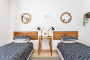 Bedroom downstairs, beds can be used as singles or together as a large double